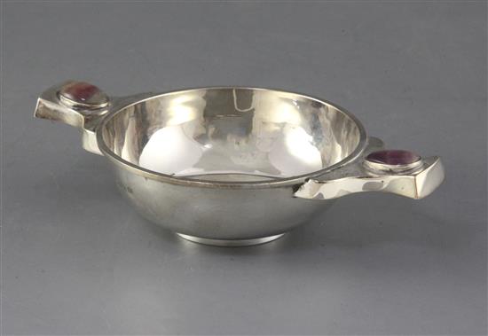 A George V silver quaich with Blue John cabochon set lug handles, by Barker Bros, 18.5cm.